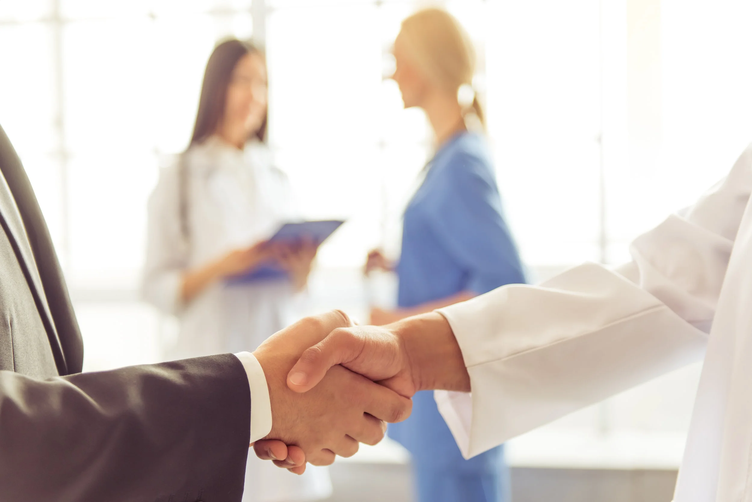 Dental professional reviewing practice performance